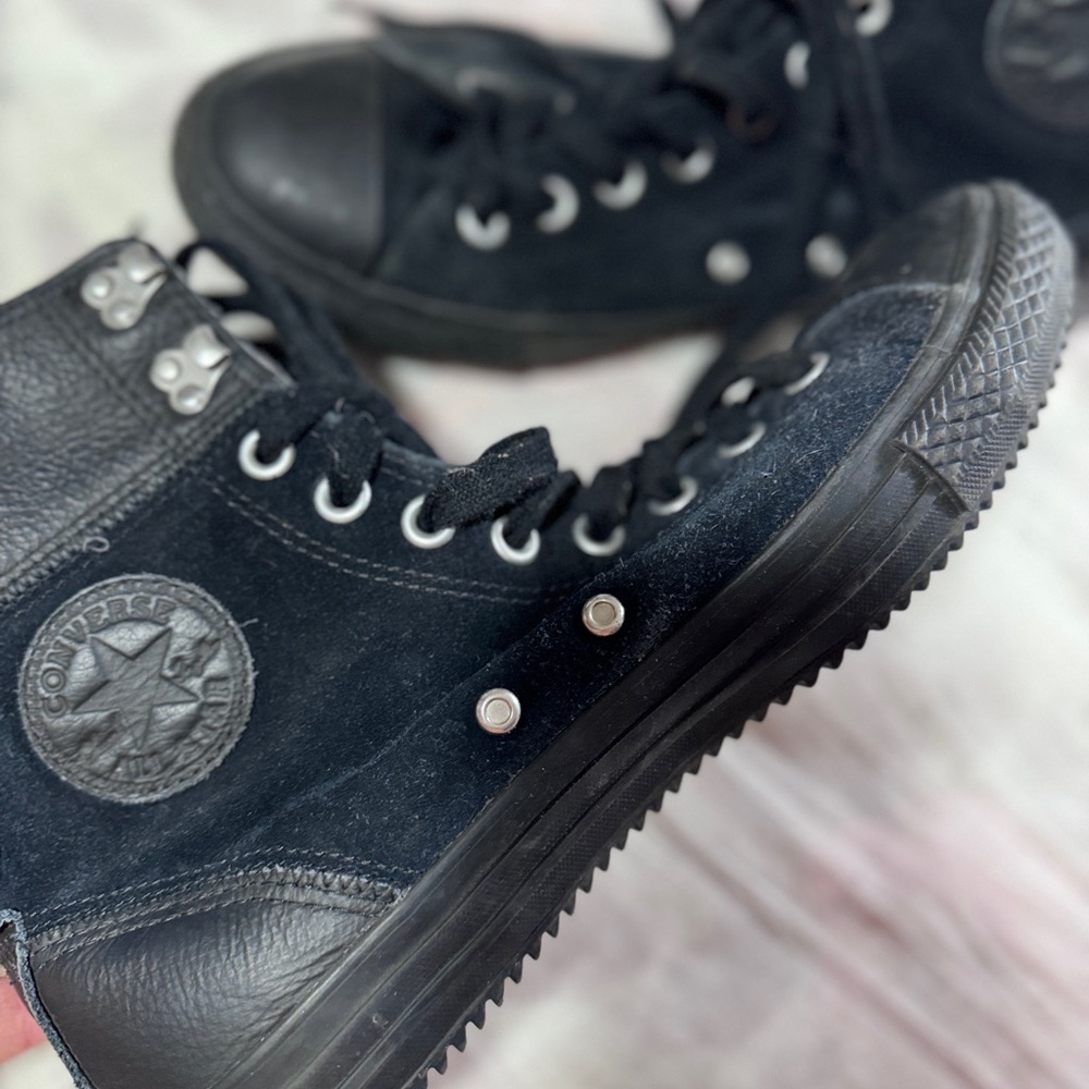 Converse black suede high tops with edgy cool soles.